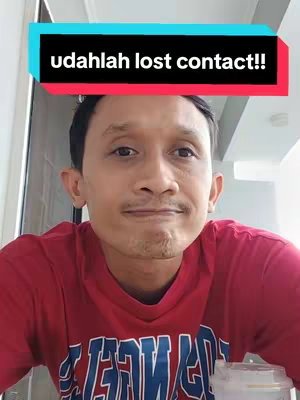 A selfie-style shot featuring a man looking at the camera. Above, within a teal rectangle with black borders, reads the text hook. The man is wearing a red shirt with a white graphic; his expression suggests indifference or resignation.