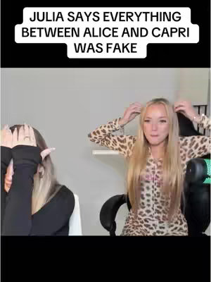 The cover image shows two young women, one with hands over her eyes and the other with long blonde hair and a leopard print top, touching her own hair. The text overlay reads 'JULIA SAYS EVERYTHING BETWEEN ALICE AND CAPRI WAS FAKE'.
