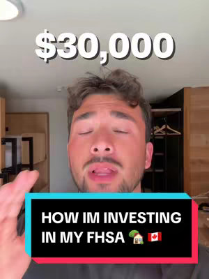 A young man with a beard and light skin is centered in the frame, slightly angled upwards. The background features a bright interior with neutral-toned walls and wooden accents. The man is looking upwards, his eyes closed, and his mouth slightly open as if speaking. Above him is a white text overlay that says '$30,000'. Below him, a black rectangular box with a red bottom displays white text that reads, 'HOW IM INVESTING IN MY FHSA' followed by image of a house and the Canadian flag next to the the written text.