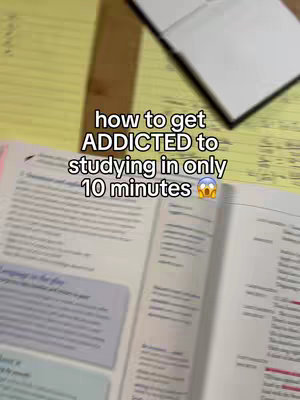 The cover image has an overhead perspective of a desk setup. In the foreground, a textbook with pages open is visible, with some writing and diagrams. On the left, another open book is visible as well. Behind the books, there's a partially visible white notebook and yellow papers. Overlayed text provides a hook to engage viewers.