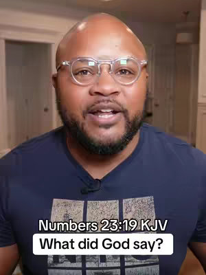 A man with glasses is centered in the frame speaking. A text overlay at the bottom provides a bible verse location and a question. The background is a white-walled room.
