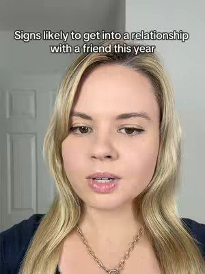 A medium shot of a woman with long blonde hair and a gold necklace, framed with a text overlay. The woman is looking directly at the camera with slightly parted lips.