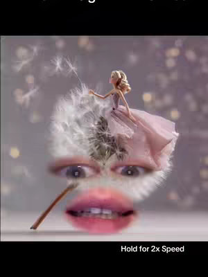 The cover image features a Barbie doll in a pink dress, seemingly riding a dandelion. Below the dandelion, eyes and a mouth are visible, creating a surreal composite. Text at the bottom of the image reads: "Hold for 2x Speed."