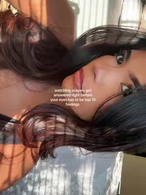 The cover image shows a close-up of a person with long, dark hair laying down. Their face is turned towards the camera with half of their face and hair visible. The text overlay displays a motivational message in white font.