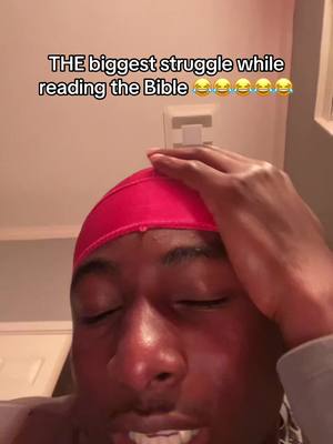The cover image shows a close-up of a young Black man with his eyes closed, wearing a red durag. His right hand rests on his forehead. Text overlayed at the top reads, "THE biggest struggle while reading the Bible" accompanied by multiple laughing emojis.