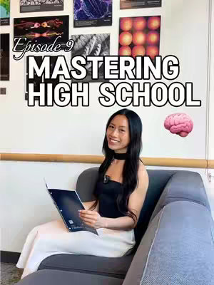 A young woman sits on a gray sofa, holding a notebook and smiling. The image features a backdrop of various illustrations and text. The title 'Mastering High School' is displayed at the top, while a brain emoji sits in the top right corner. The background consists of a beige wall with the woman seated and books around the room.