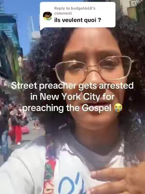 A selfie-style video cover image shows a woman with glasses in the foreground, looking at the camera. Text overlays are present. The background appears to be an urban street scene with blurred figures.