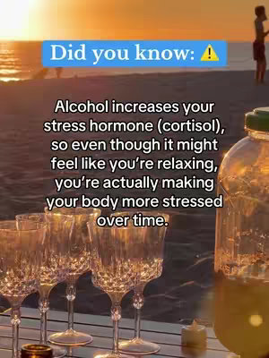 The image is a sunset beach scene. There is a person walking in the distance. In the foreground, there are several wine glasses on a table and a pitcher of a yellow liquid. Text overlays are placed over the image, presenting information about the effects of alcohol.