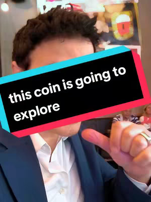 A selfie-style video with the creator's face partially visible, overlaid with a text box. The creator is wearing a suit, and a restaurant or bar environment is partly visible in the background.
