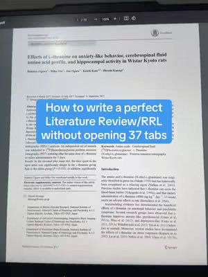A screenshot of a research paper displayed on a laptop screen. The screen displays text about the effects of L-theanine on anxiety and other mental health concerns. A blue rectangle overlay covers part of the screen containing white text.