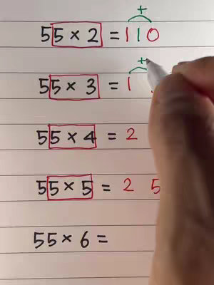 A person's hand holding a pen and writing on a piece of paper. The paper has equations and mathematical expressions written on it, including multiplication problems. The equations seem to be math tricks or tips, possibly a tutorial.