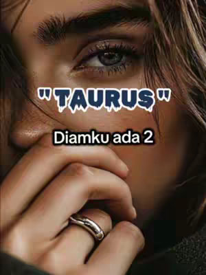 A close-up shot of a person's eye and part of face, with text overlayed across the top and bottom. The person's eye is the focal point, surrounded by soft, blurred skin. The text sits over the image: 'TAURUS' above and 'Diamku ada 2' below.