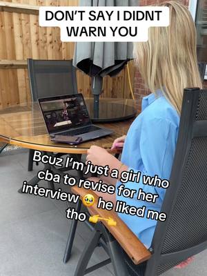 The cover image shows a young woman sitting outside at a table with a laptop. She's turned away from the camera, possibly looking at the laptop screen. Text overlays are added to the image as a hook. The setting appears to be a patio or outdoor area.