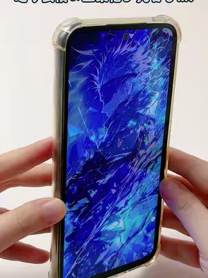The image shows a smartphone held between two hands with a clear protective case. The phone's screen displays a vibrant, abstract design in shades of blue. The background, which appears to be a surface, is a plain white.