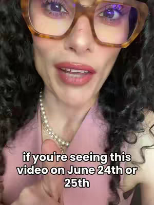 A close-up shot features a woman with curly dark hair, wearing large, square, tortoise-shell glasses, and a pink top with a necklace. She is looking towards the camera with a slight smile. Text overlayed on the image reads, 'if you're seeing this video on June 24th or 25th.'