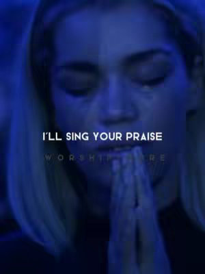 A close-up shot in a blue-toned setting. The image focuses on a woman with light skin and blonde hair, her face partially visible as she looks downward with her hands clasped in prayer. The background is blurred, with text overlayed, reading "I'LL SING YOUR PRAISE" and "WORSHIP HERE".
