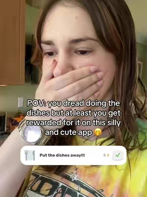 A young woman is shown in a close-up shot, partially covering her mouth with her hand. She is looking downwards with a concerned or surprised expression. White text overlays the image, along with an app interface element at the bottom.