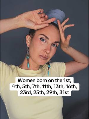A woman with fair skin, wearing a light yellow shirt and a blue head wrap, looks directly at the camera. She is wearing dangly turquoise earrings . The image includes white text at the bottom of the image.