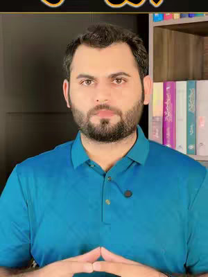 A man in a blue collared shirt poses in front of a black background with a bookshelf visible behind him. Text is overlayed on the top. The overall composition has a professional aesthetic.