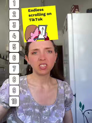 A woman with long brown hair is framed from the mid-chest up. She has a slightly open mouth and is looking at the camera with a concerned expression. Above her head is a yellow square with text, including a cartoon image of someone interacting with what appears to be a phone.