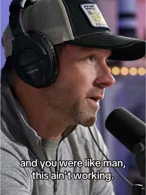 The cover image shows a man wearing a baseball cap, headphones, and a microphone. He is speaking, and text appears at the bottom that reads, "and you were like man, this ain't working."