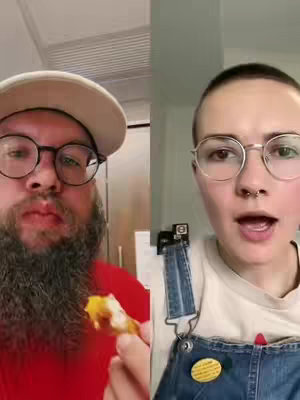 A split-screen image. On the left, a man with a beard and glasses holds a piece of food to his mouth. On the right, a person wearing glasses and overalls. Both appear to be talking. The background is blurred.