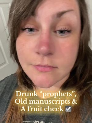 A selfie-style shot featuring a woman looking down with a slight frown. The background is out of focus, featuring a white door and wall area. Overlayed text is added to the image.