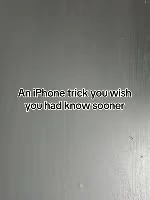 The image has a plain grey background with centered text overlayed with a white font. The text says, "An iPhone trick you wish you had known sooner".