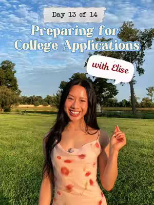 A young woman with long dark hair smiles at the camera while standing in a sunny field. The background includes a blue sky with fluffy white clouds, green trees, and a field of green grass. The woman is wearing a light-colored dress with floral patterns. Text overlays at the top indicate the video's theme and a caption bubble with additional text.