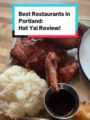 The cover image shows a close-up of a meal. Fried chicken pieces are arranged next to a scoop of sticky white rice and a small bowl of dark sauce. The image is lit with natural light, and the food appears appetizing.
