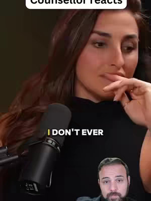 A woman with long brown hair is speaking into a microphone. Text overlaid reads, "I DON'T EVER" and another man appears in a small frame at the bottom of the screen.