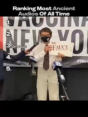 The cover image shows a man in a business suit, wearing a mask, holding a sign that says Dr. Fauci. He is surrounded by microphones, and text overlays rank "Ancient Audios of All Time".
