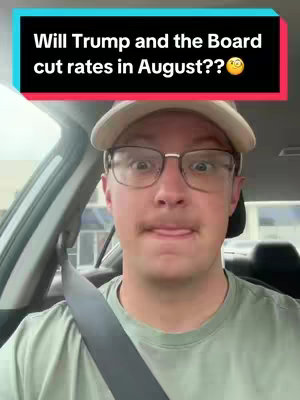 A man in a car wears glasses and a baseball cap with text overlaid at the top. He has his tongue out and the background is visible.