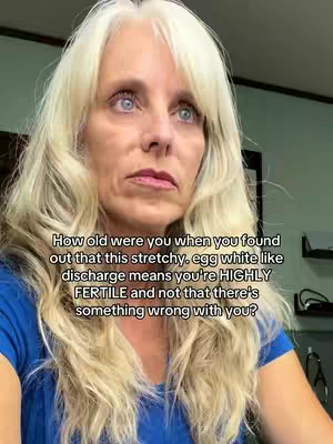 The image features a close-up of a woman with long blonde hair looking slightly off-camera with a concerned expression. Text is overlaid at the bottom, framed in a white box. The background is a muted, greenish-blue.