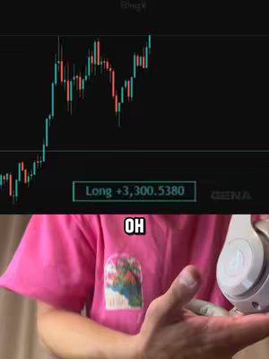 The image is split into two parts. The top half shows a live trading chart in shades of red, green, and black, with a green rectangle indicating a long position and a displayed profit. The bottom half features a person wearing a pink t-shirt; the person's hand is holding white headphones. Text overlay 'OH' is visible.
