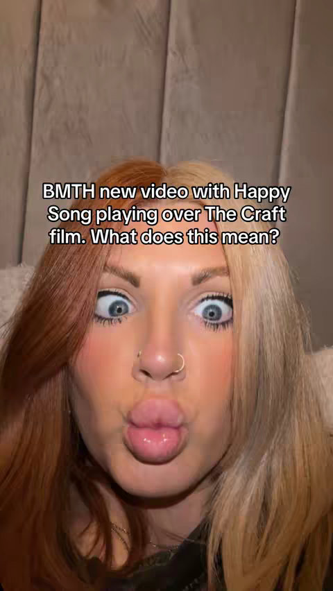A close-up shot of a woman with multicolored hair holding her face expressing a surprised look, with text overlayed on top.