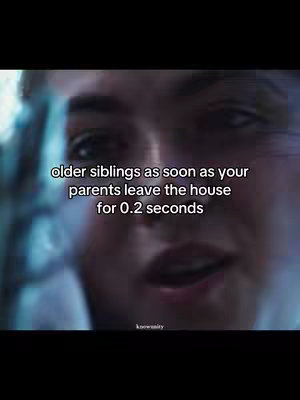 A close-up of a person's face from a movie, with overlayed text. The person is looking towards the camera, with a slightly blurred background. The text is in white and easy to read against the darker base.