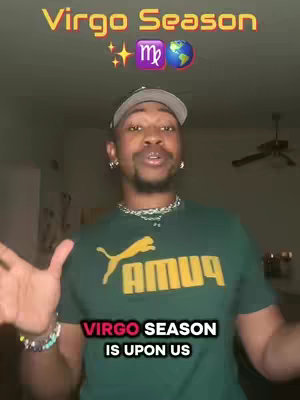 A man with a beard and a backward baseball cap stands in front of a camera with his hands in the air. Above his head appears the words “Virgo Season” in yellow. Above that are sparkles and a Virgo symbol. He is wearing a green t-shirt with a yellow Puma logo and necklace. Below his face appears the words 'Virgo Season is upon us'.