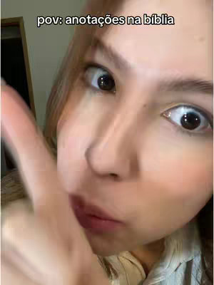 A close-up shot features a woman with wide eyes, her finger pointed towards the camera, and text overlaying the image. The background is blurred, focusing attention on her facial expression.