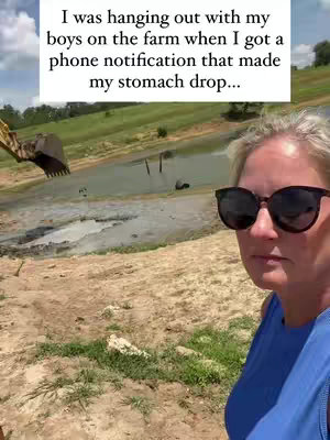 A woman stands outdoors, wearing sunglasses, facing the camera. The background shows a construction site or a farm setting with an excavator visible. Text overlayed on the top.