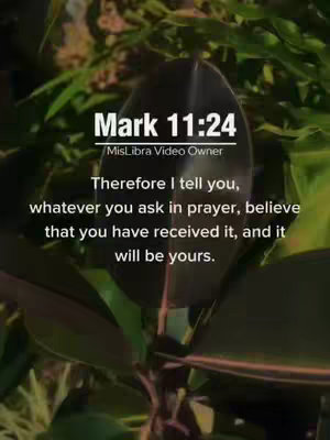 A vertical image with a blurred background of green foliage. In the center, a large, dark green leaf is prominent. Overlaid on the image is white text, including a Bible verse, chapter, and verse number (Mark 11:24). Additional text at the top indicates the video owner.