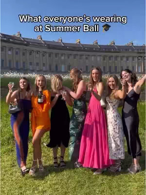 The cover image shows seven young women posing outdoors in front of a building. They are all dressed in stylish dresses of various colors and carry drinks. The overall composition features them standing on grass with the building in the background, creating a summer-themed, celebratory atmosphere.
