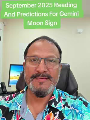 A man in a colorful shirt and glasses is the main focus, with text overlayed at the top. The background includes an office-like setting with a computer monitor. The color scheme is muted, mainly utilizing light greens for the text and background, and the man's skin tone provides warmth.