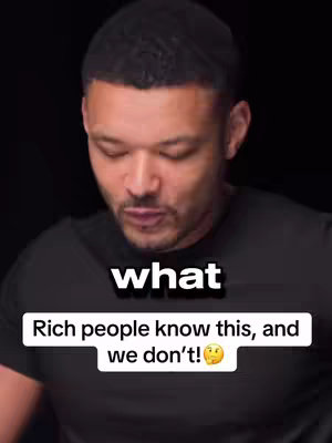 The cover image shows a man from the chest up, with a black background. He is looking down and slightly off-center. The man has short, dark hair and a neutral expression. He wears a dark-colored t-shirt. Overlaid text in white font reads "what", and below that, in a white box, reads "Rich people know this, and we don't! 🤔"