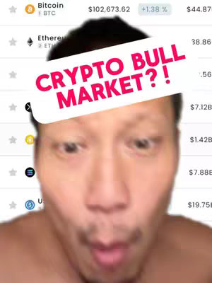 A close-up shot showing a man with a surprised expression. The man's face is in the center with eyes wide and mouth slightly open. Overlayed on the image is a pink rounded rectangle with the text 'CRYPTO BULL MARKET?!'
