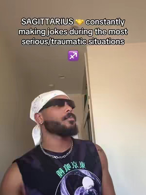 The image features a man with a beard, sunglasses, and a white bandana. Text overlays above and below describing the Sagittarius star sign.