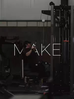 The cover image shows a person working out in a gym. The person is positioned near a weight machine. The image has a white overlay in the center of the frame with the large word "MAKE" across it.