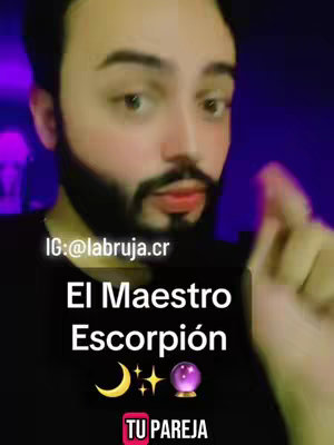The cover image features a man with a beard, looking directly at the camera. Text overlays include 'El Maestro Escorpión' with zodiac and celestial symbols. Additional text mentions 'TU PAREJA' at the bottom and social media handle.