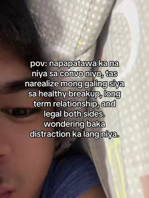 A person's face is shown close up with the text overlay. The person is lying in bed and is partially covered by what appears to be a blanket or a pillow. The lighting is soft, and the focus is on the person's face. The composition is simple, with the text at the top.
