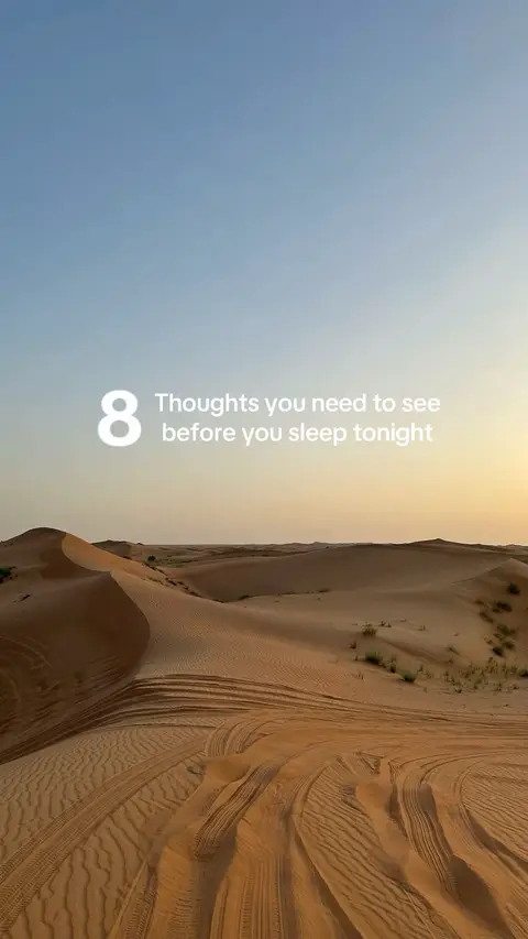 The cover image shows a desert landscape with sand dunes under a clear blue sky. The sun is setting, casting a warm glow over the scene. A pair of tracks lead into the sand dunes.